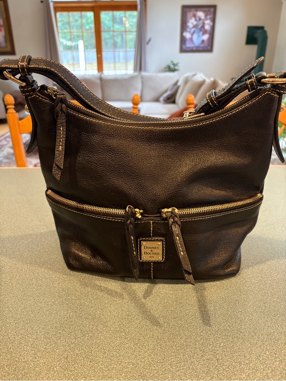 Dooney & Bourke Black Pebbled Leather Shoulder Bag with Front Zip Pocket
